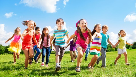 Kids running enjoying summer